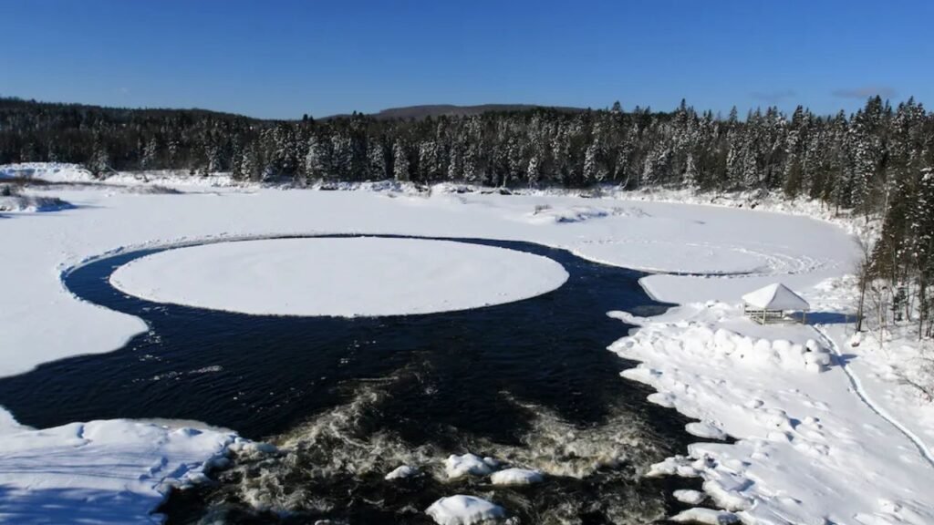 What causes perfectly circular ice formations on lakes?